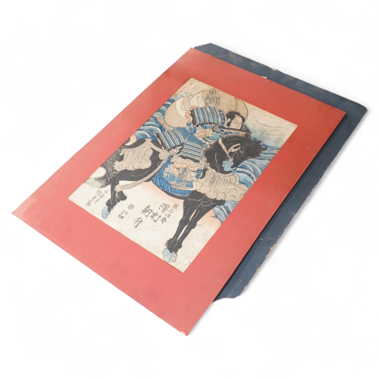 A collection of Japanese woodblock prints comprising Utagawa Kuniyoshi (1797-1861), After Utagawa Kuniyoshi, ‘Benkei on the Boat’ and another depicting a Samurai warrior on horseback, mounted, unframed, largest 35 x 24cm